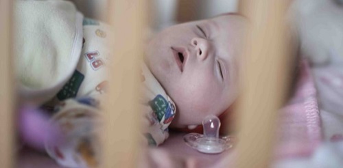 Keep Pacifiers From Falling Out of Crib